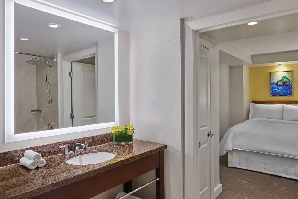 Villa bathroom vanity beside adjoining bedroom at The Westin St. John Resort Villas.