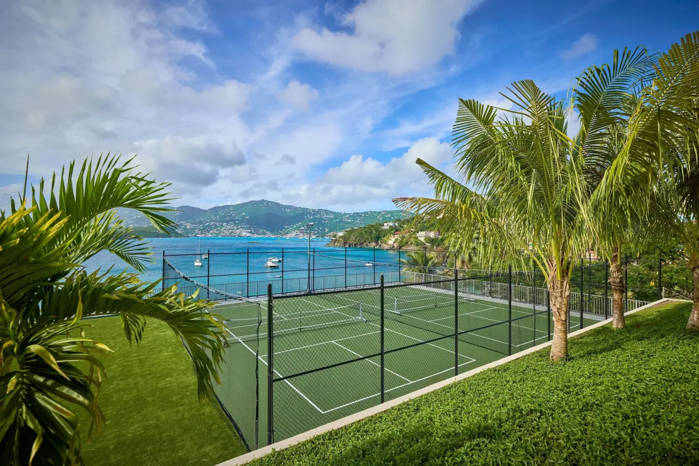 Tennis courts overlooking the bay at The Westin St. Thomas Beach Resort & Spa.