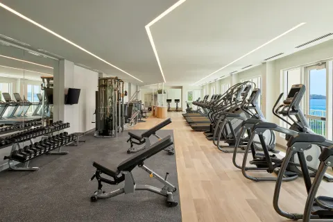 Fitness center with weights and cardio machines at The Westin St. Thomas Beach Resort & Spa.