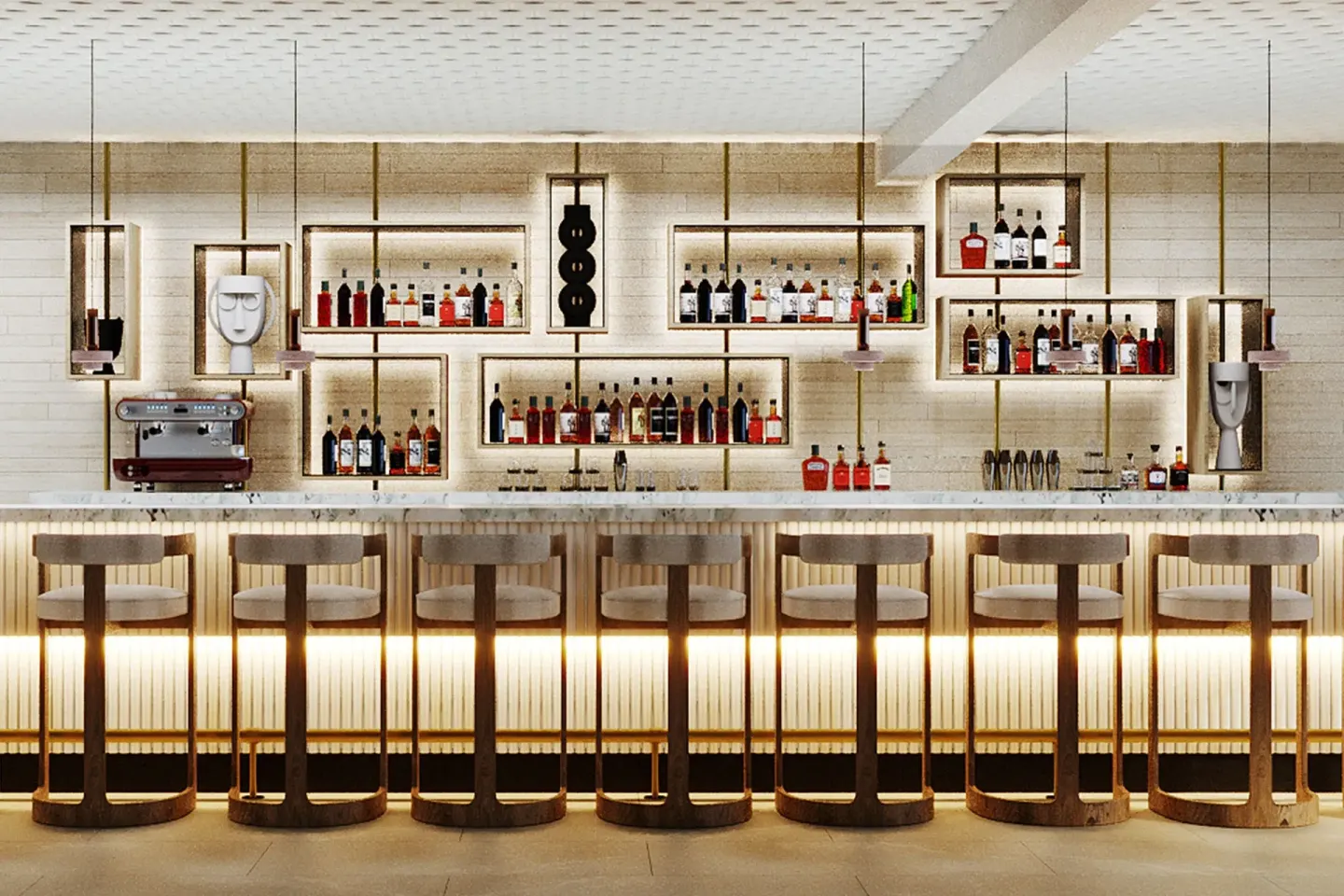 Illuminated bar with stools and bottle displays at The Westin St. Thomas Beach Resort & Spa.