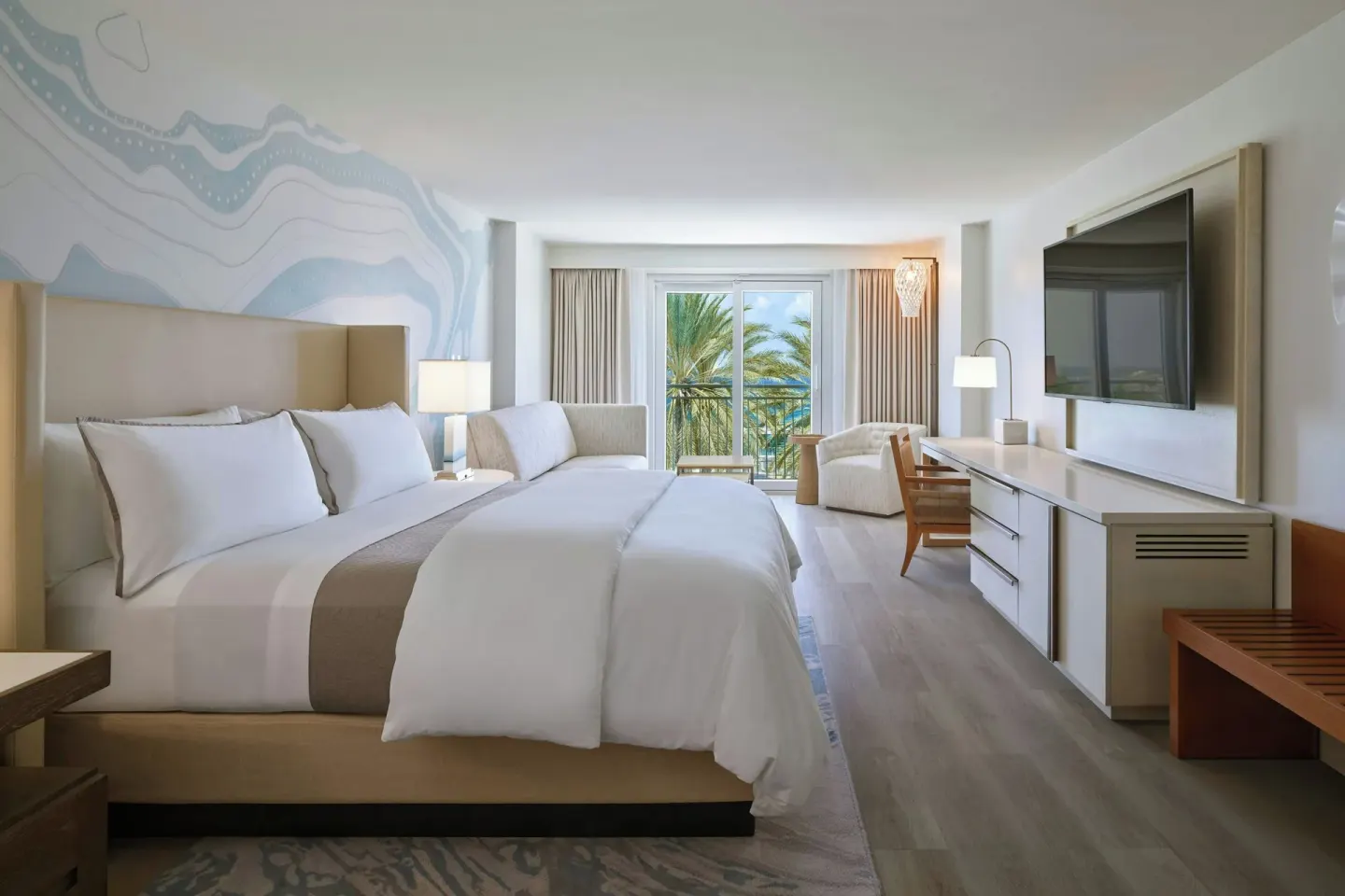 Sofa bed partial ocean view room with king bed at The Westin St. Thomas Beach Resort & Spa.