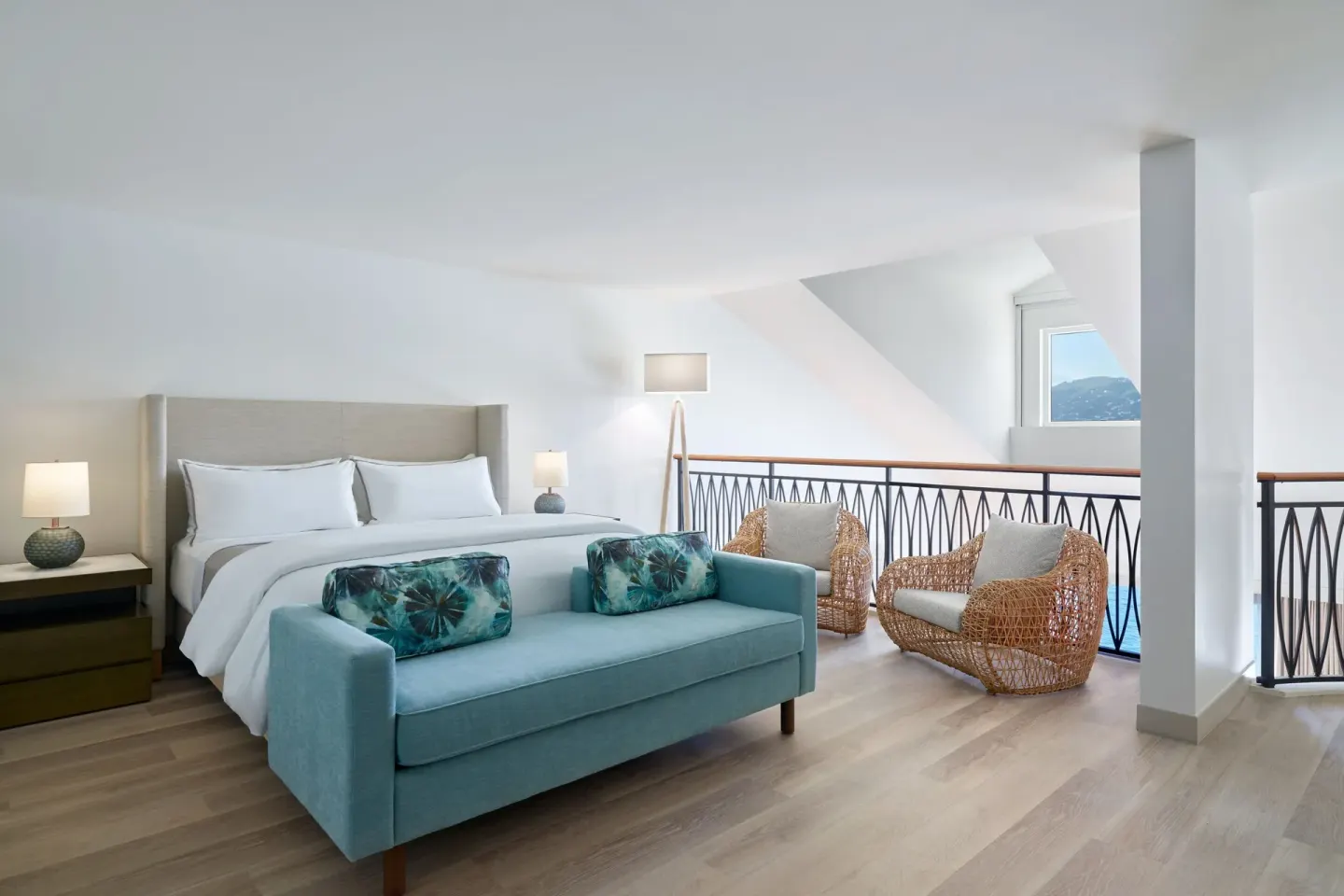 King bed in the loft of a one-bedroom balcony suite at The Westin St. Thomas Beach Resort & Spa.