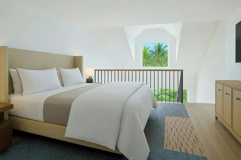 King bed in a lofted garden view suite bedroom at The Westin St. Thomas Beach Resort & Spa.