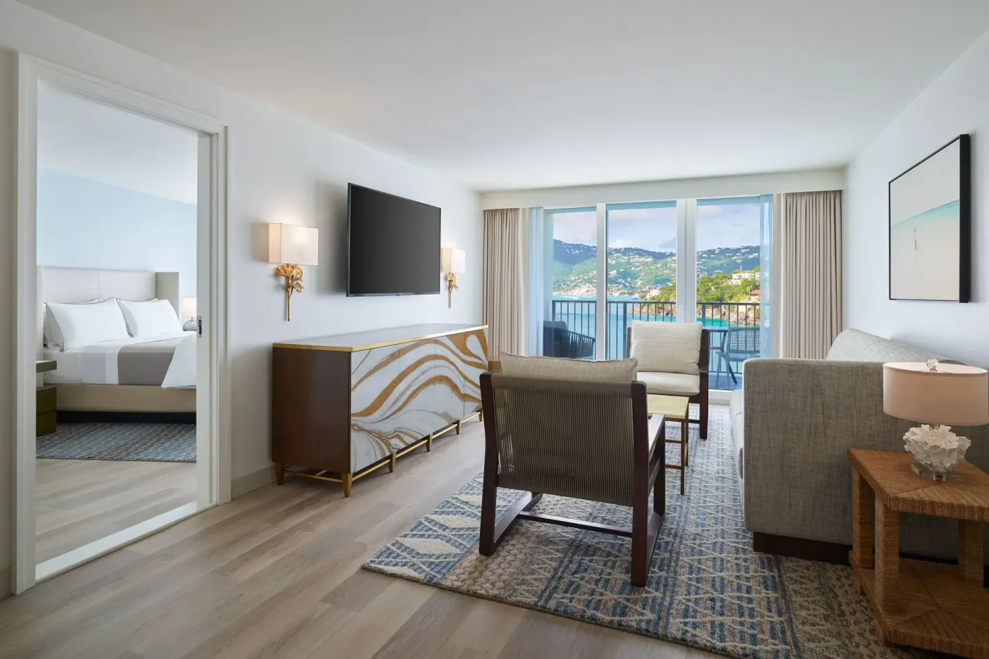 One-bedroom ocean view suite living room and bedroom at The Westin St. Thomas Beach Resort & Spa.