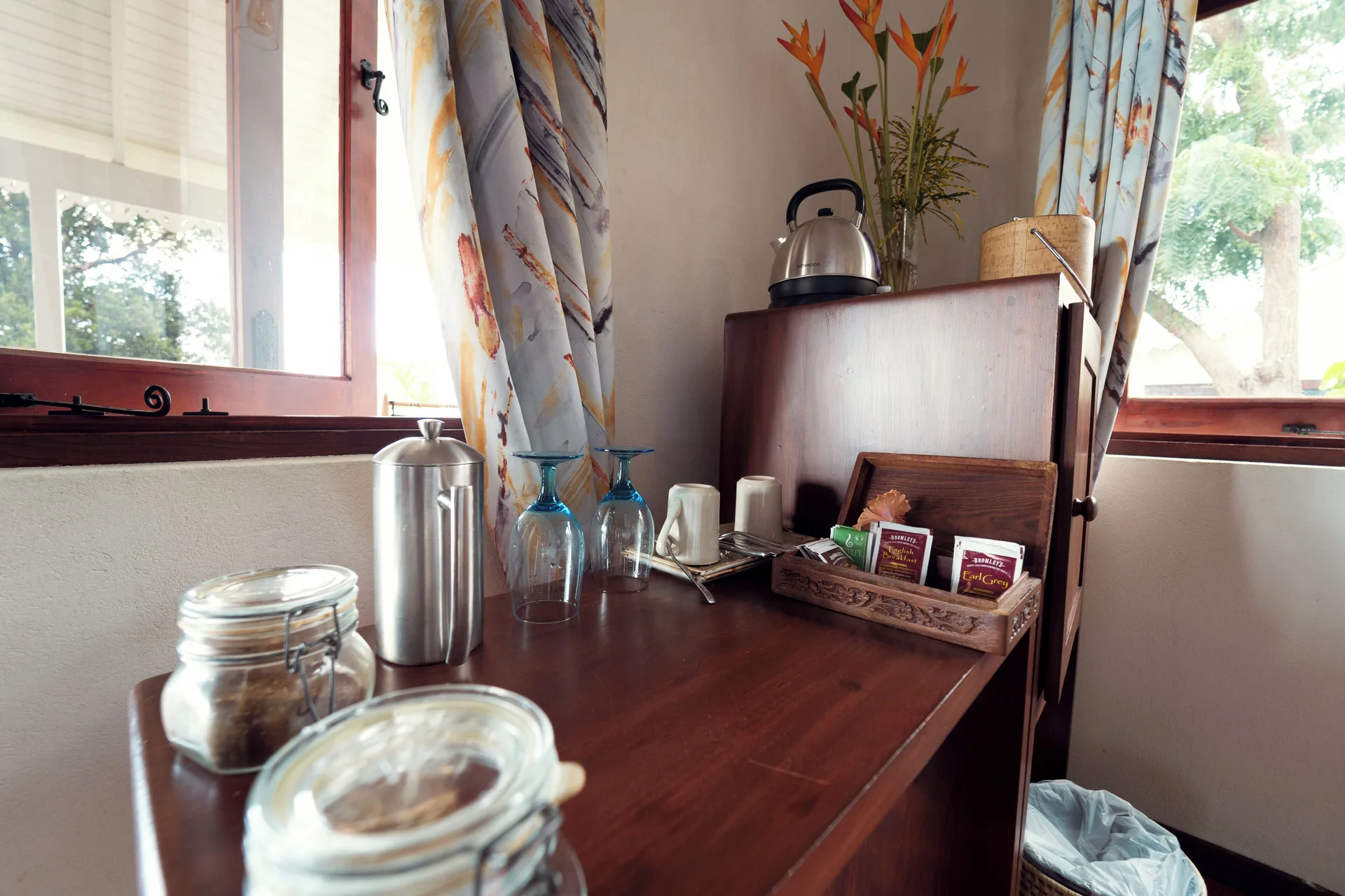 Ocean View Cottage beverage station with kettle, glasses, and tea tray at Ti Kaye Resort & Spa.