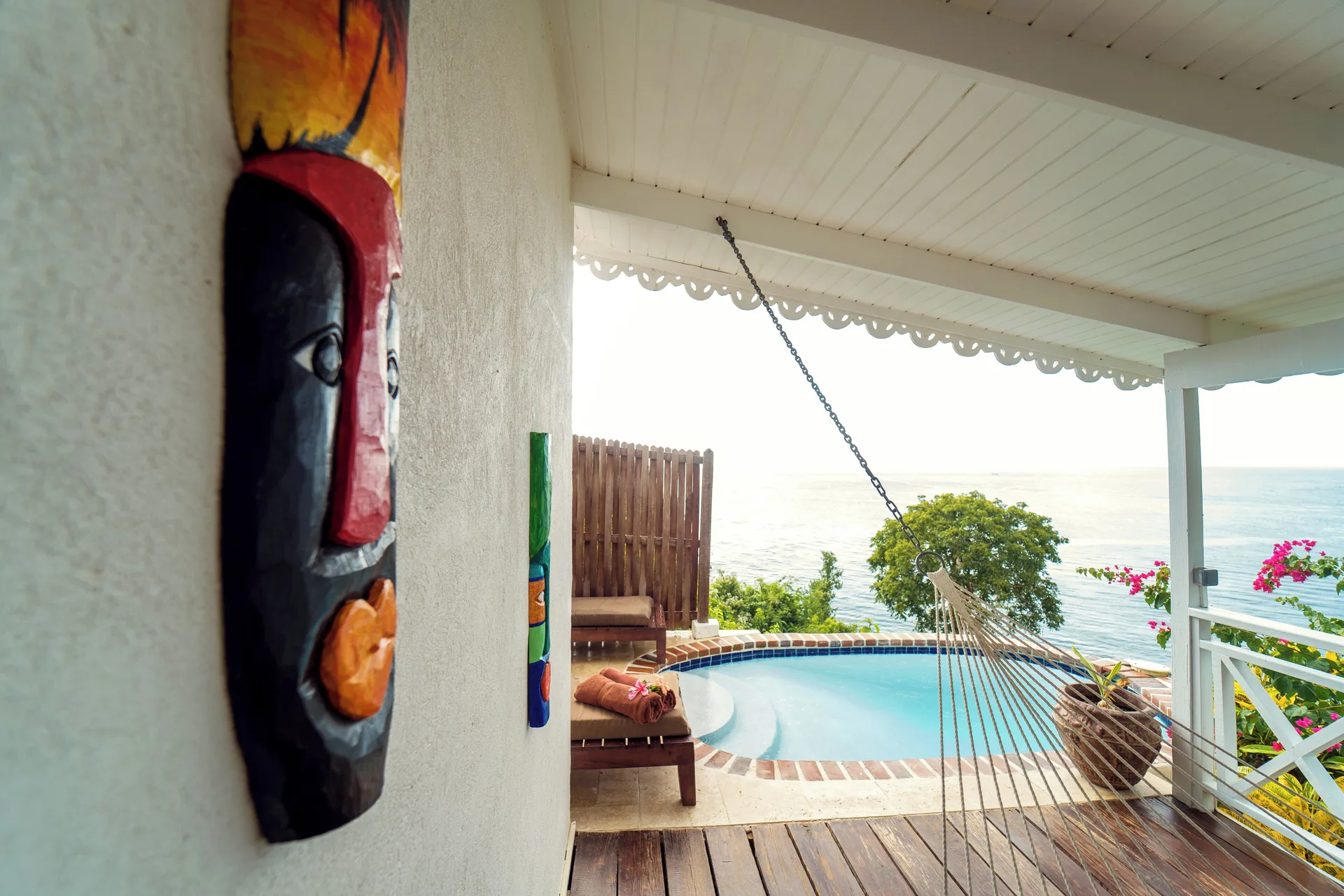 Ocean View Cottage with Pool veranda at Ti Kaye Resort & Spa with hammock, plunge pool, and sea view.