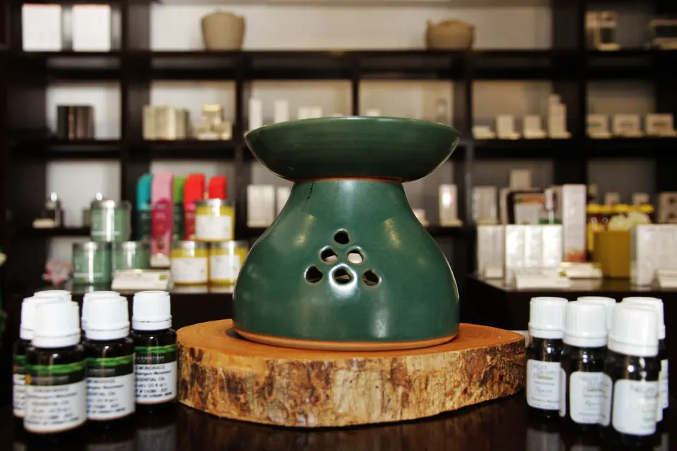 An aromatherapy burner and small bottles sit on a spa counter at Tortuga Bay Hotel.