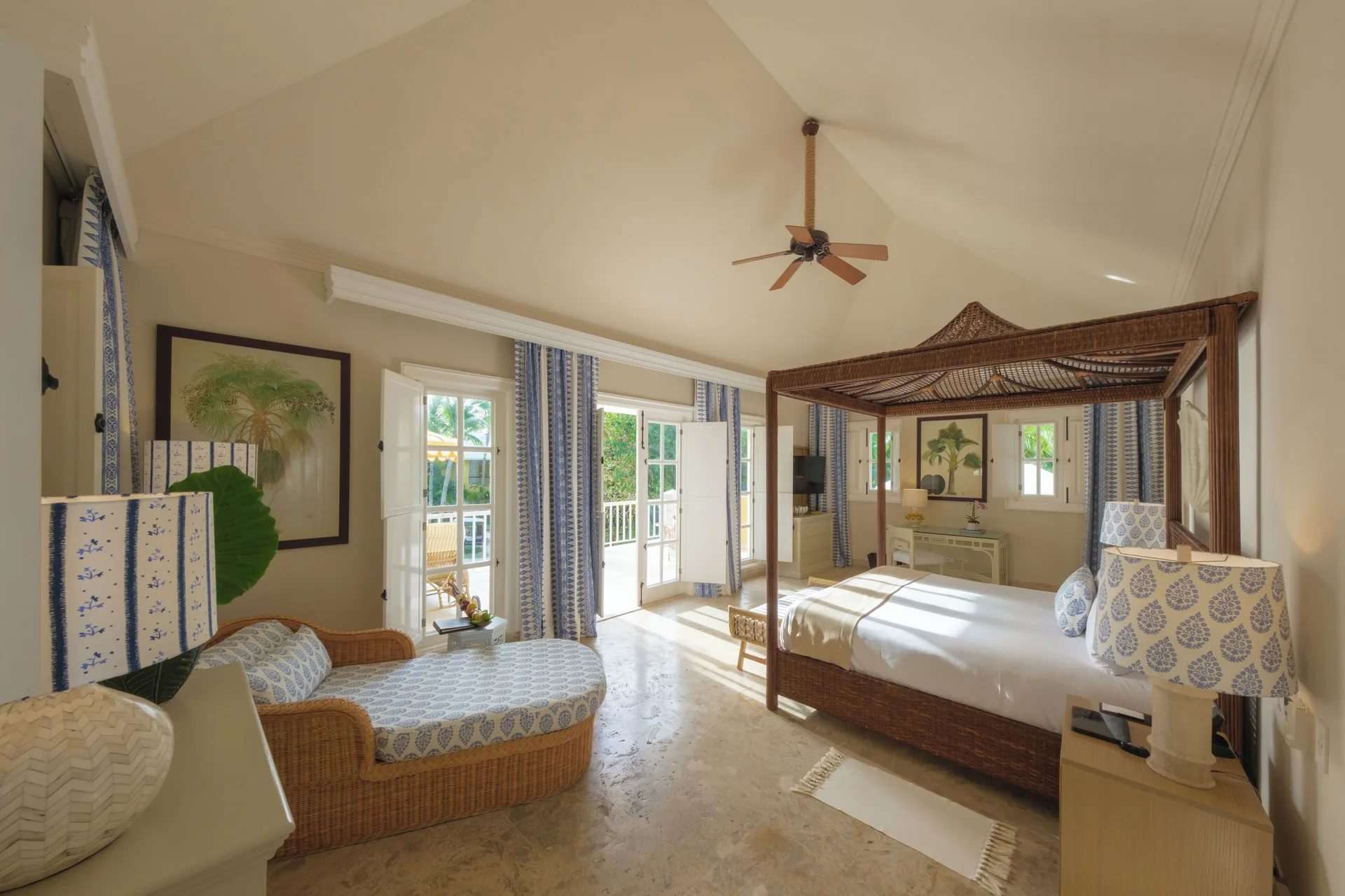 Ocean View Two Bedrooms Suite with canopy bed and chaise at Tortuga Bay Hotel.