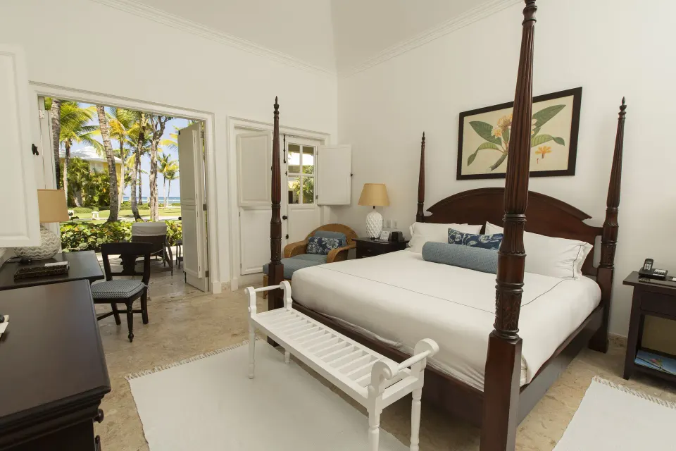 Ocean View Two Bedrooms Suite king bedroom with four-poster bed at Tortuga Bay Hotel.