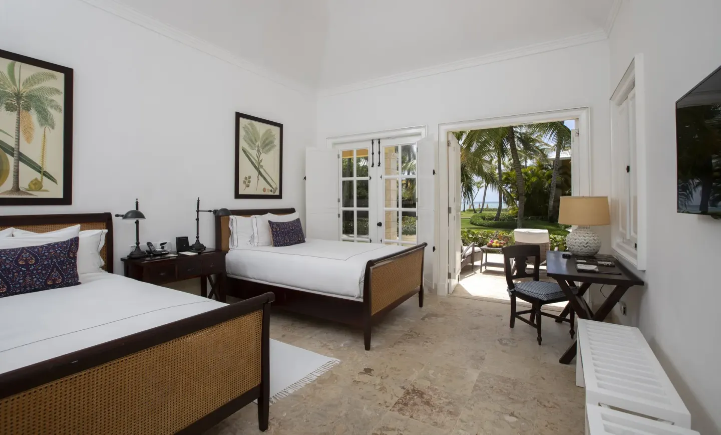 Ocean View Two Bedrooms Suite with two beds and patio at Tortuga Bay Hotel.