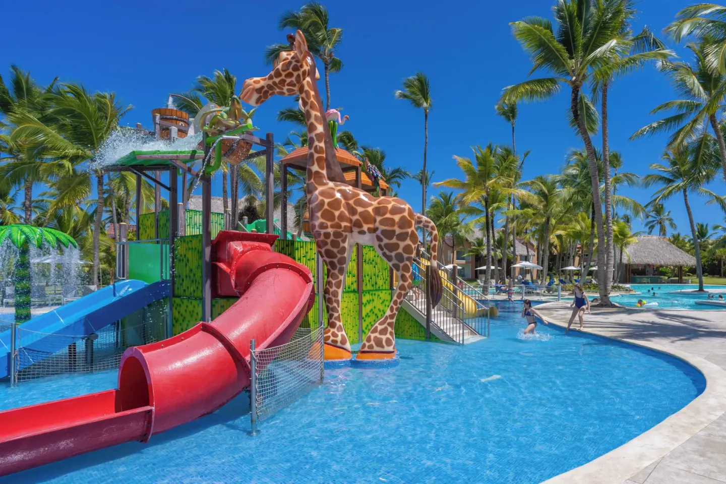 Giraffe-themed water slide area in the pool at Tropical Deluxe Princess.