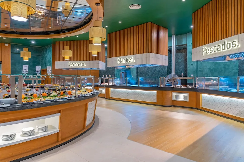 Buffet counters and labeled food stations at Tropical Deluxe Princess.