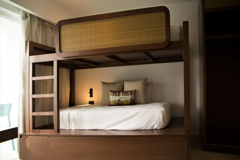 Family Room bunk bed area beside the window at Tropical Deluxe Princess.