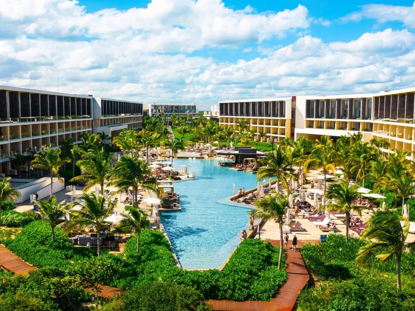 Aerial view of the central pool and resort buildings at TRS Coral Hotel.