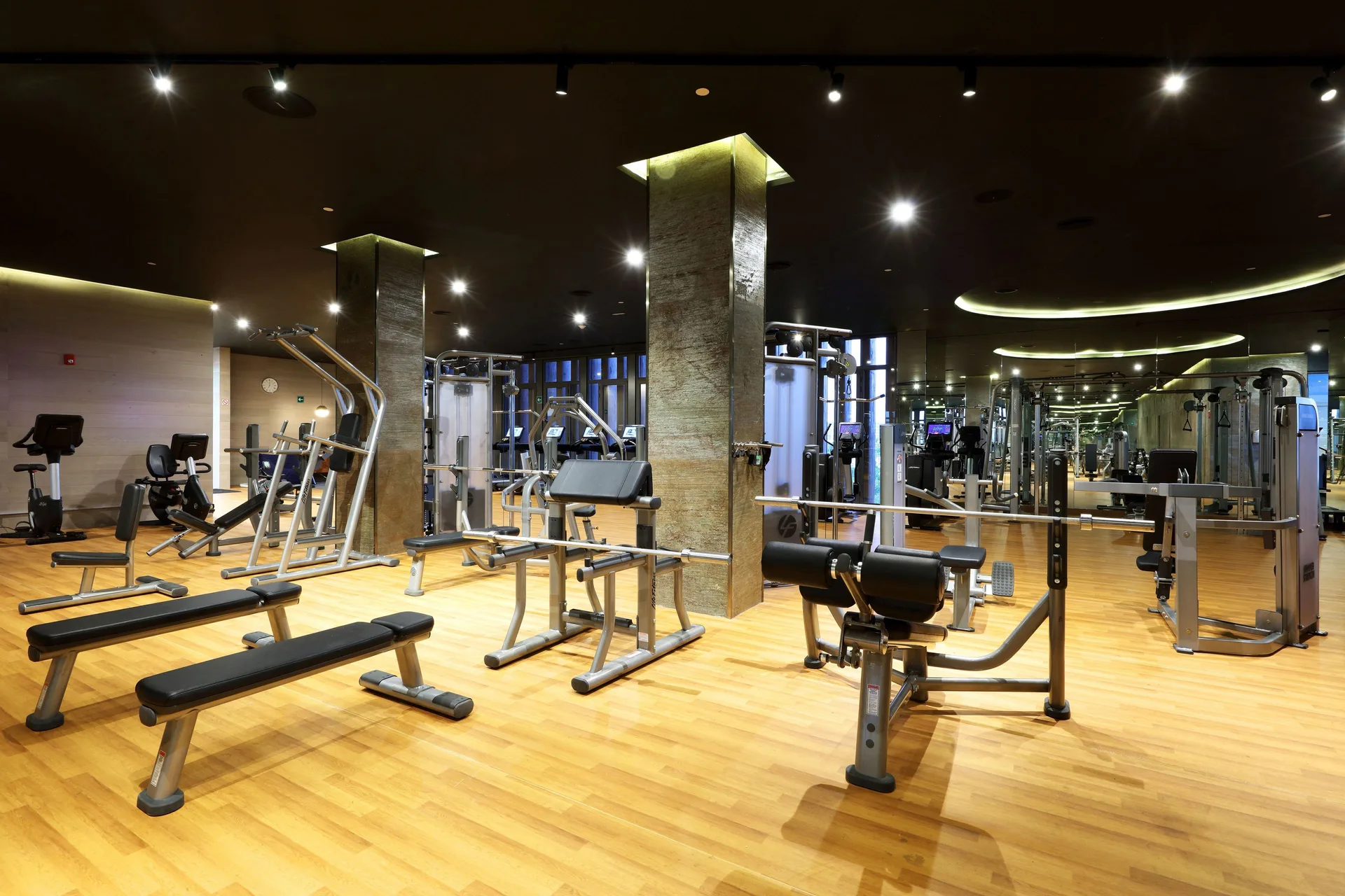 Strength-training equipment in the fitness center at TRS Coral Hotel.