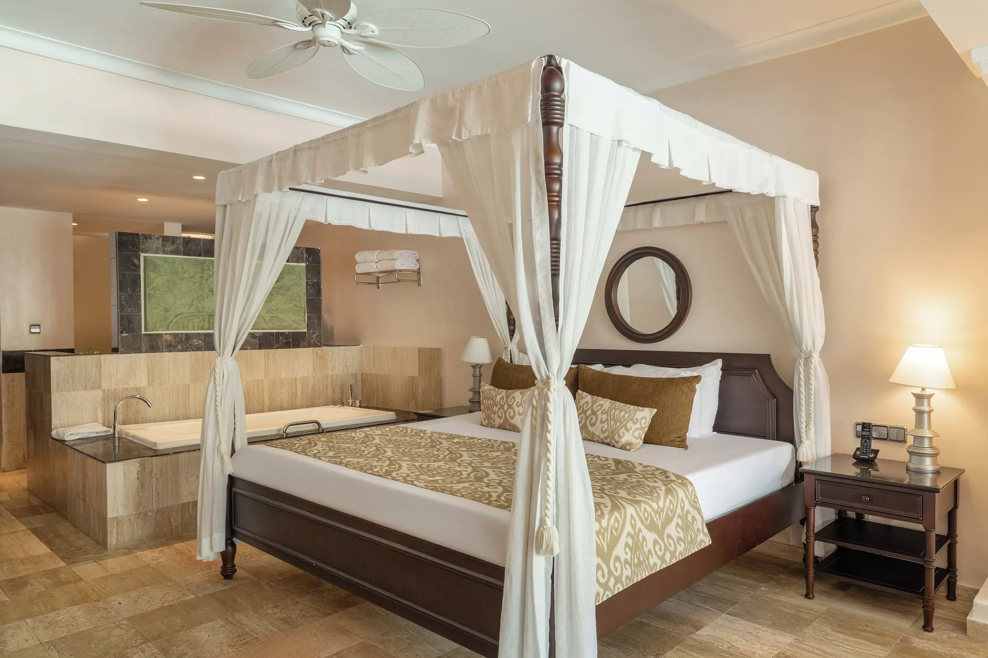Junior Suite Swim Up king bed with in-room tub at TRS Turquesa Hotel.