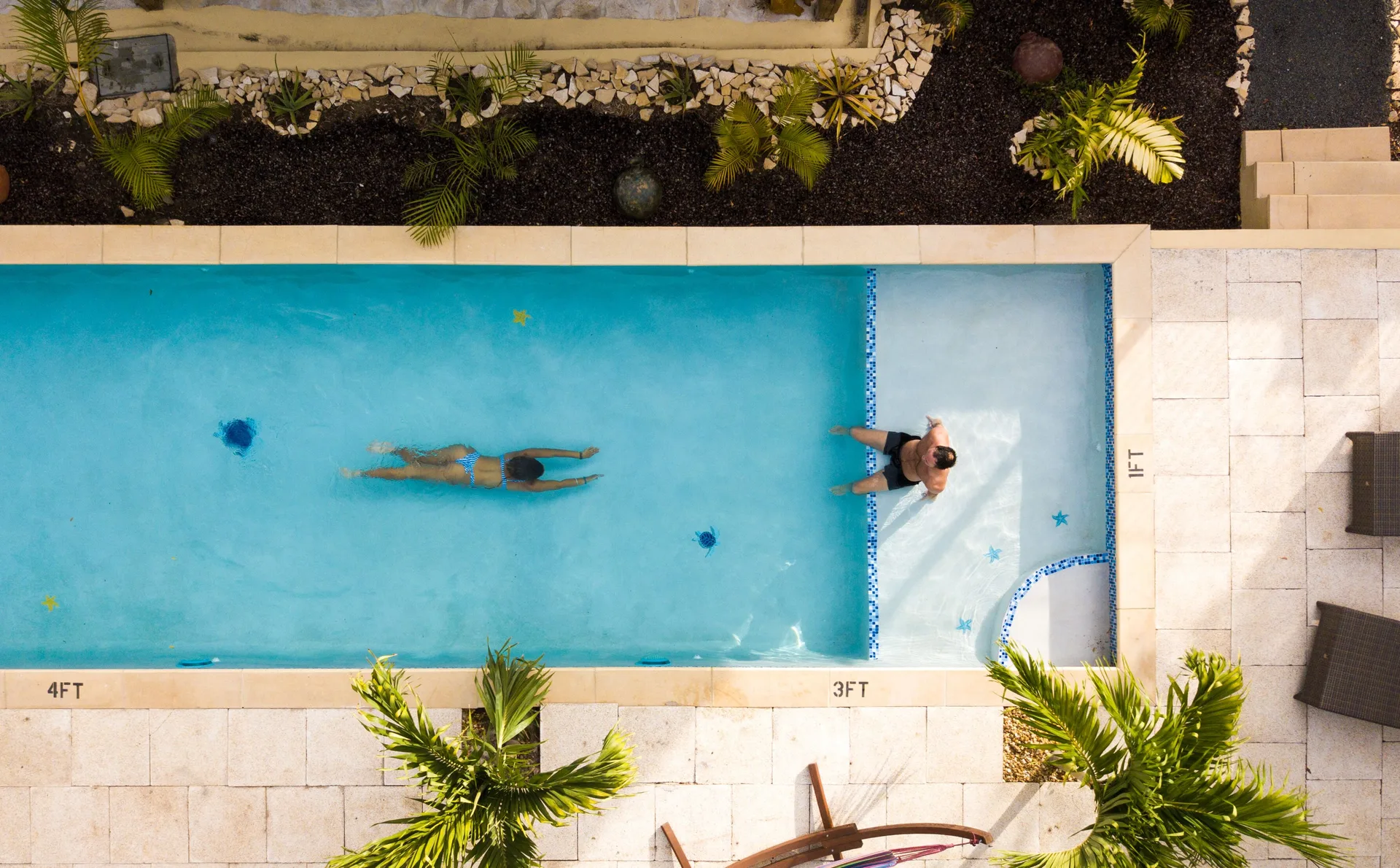Overhead view of the Cocoa Pod Suite pool area at True Blue Bay Resort.