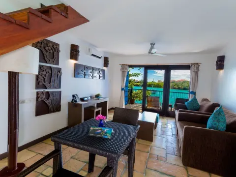 Inside the Water Front Suites at True Blue Bay Resort — from the hotel's own gallery.