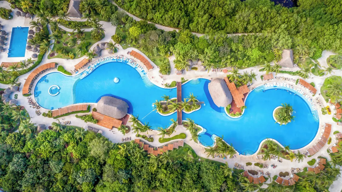 Aerial view of the expansive pool complex at Valentin Imperial Riviera Maya.