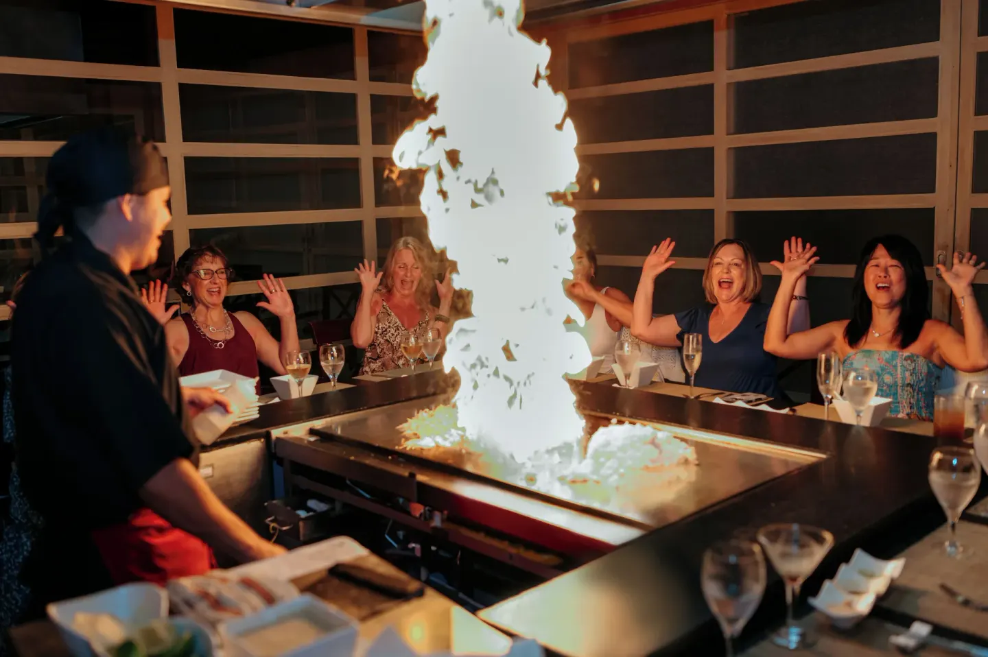 Teppanyaki chef cooks with a tall flame for guests at Valentin Imperial Riviera Maya.