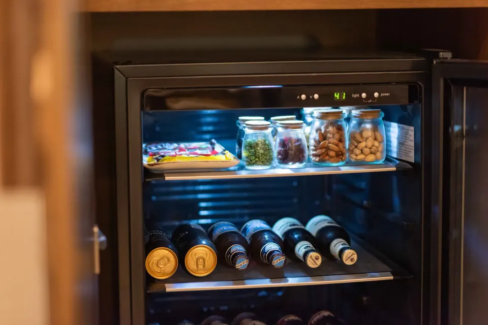 Diamond Suite minibar with drinks and snacks at Valentin Imperial Riviera Maya.