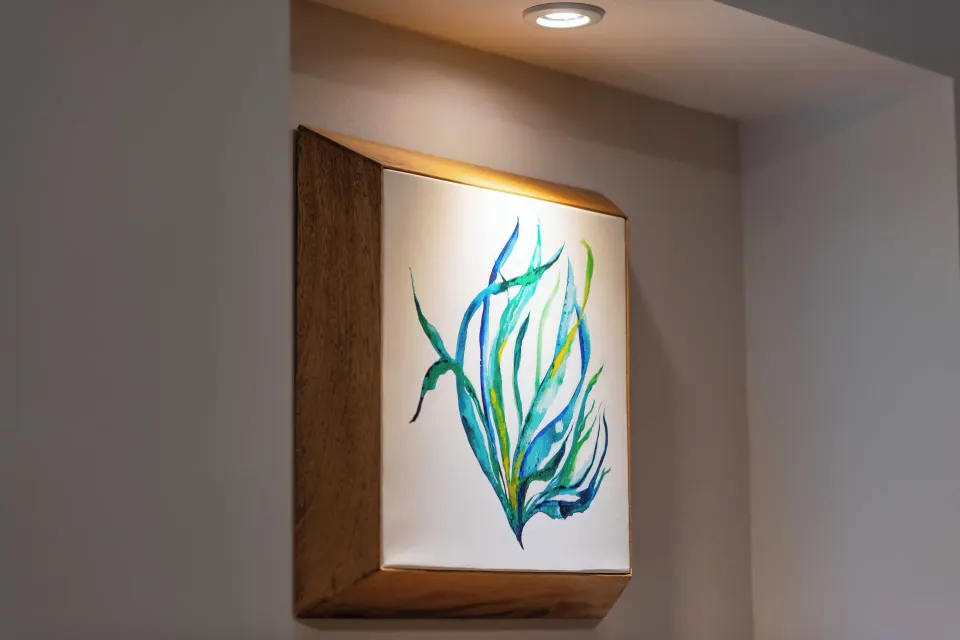 Framed tropical wall art in an Emerald Junior Suite at Valentin Imperial Riviera Maya.