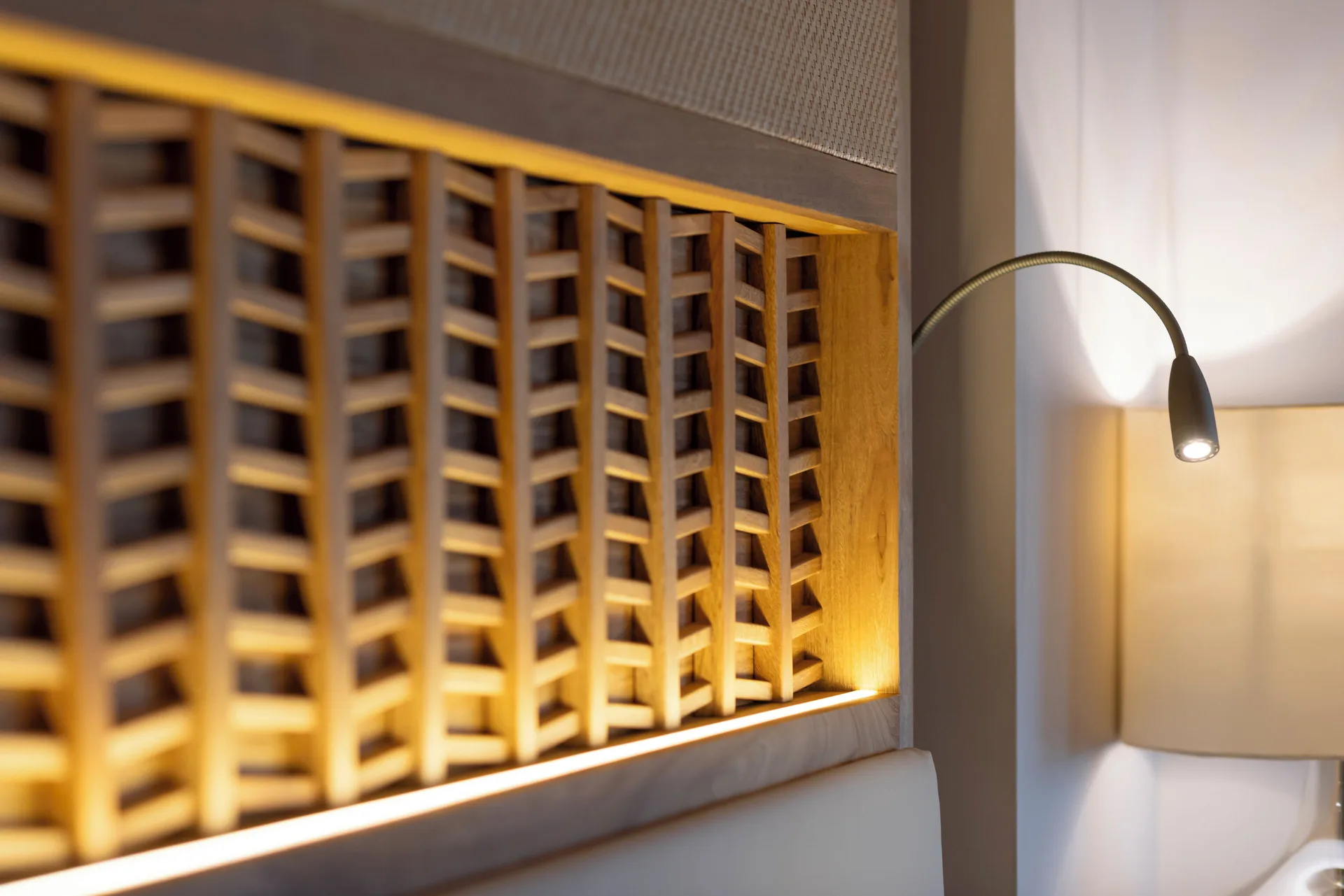 Emerald Junior Suite headboard lighting detail at Valentin Imperial Riviera Maya.