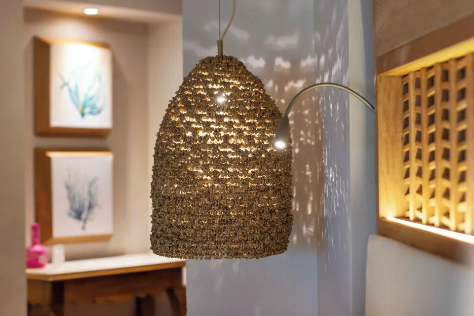 Emerald Junior Suite woven pendant and wall art at Valentin Imperial Riviera Maya.