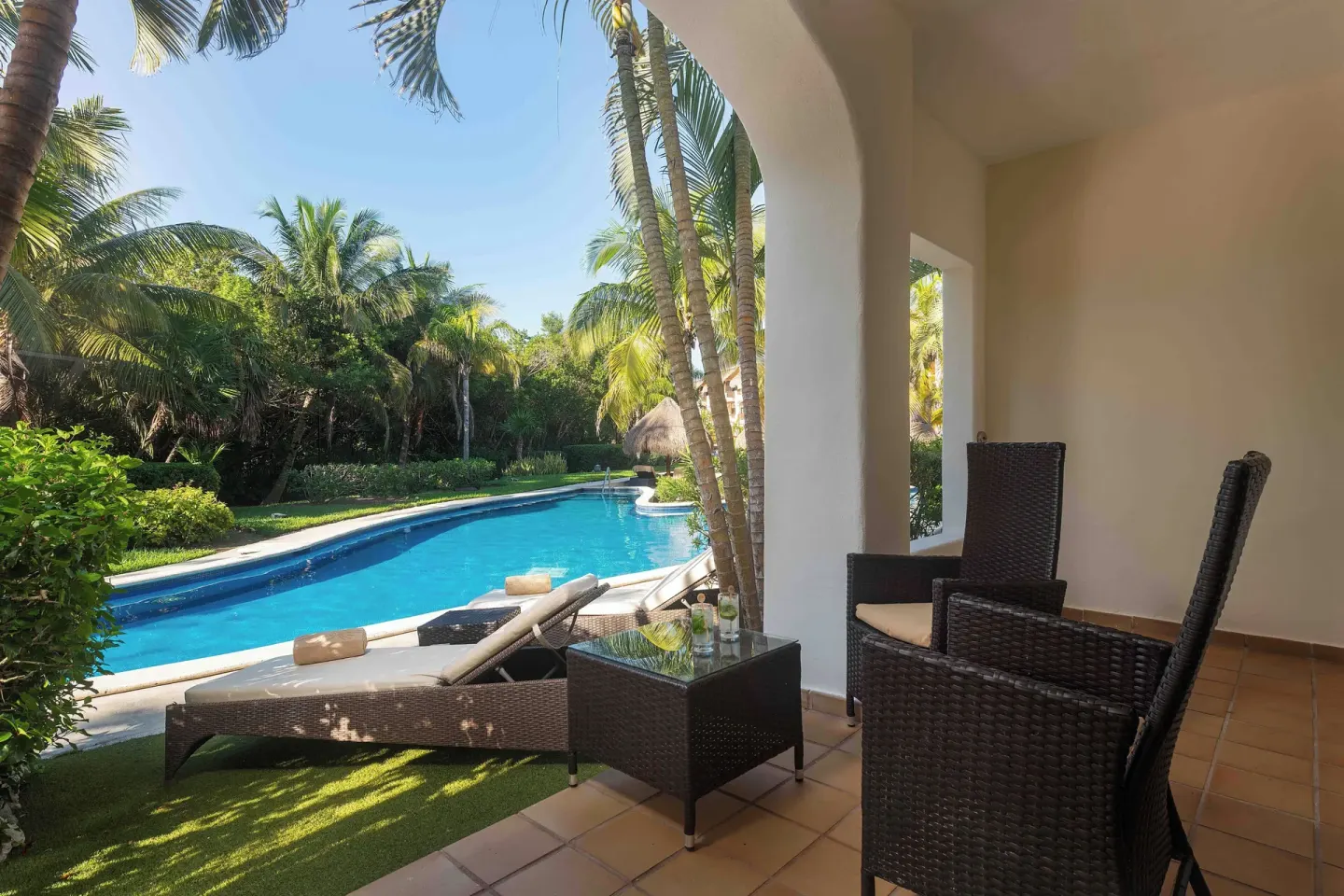 Golden Swim Up Junior Suite terrace beside the pool at Valentin Imperial Riviera Maya.