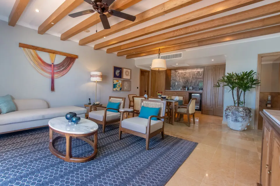 Suite Imperial Privé living room and dining area at Valentin Imperial Riviera Maya.
