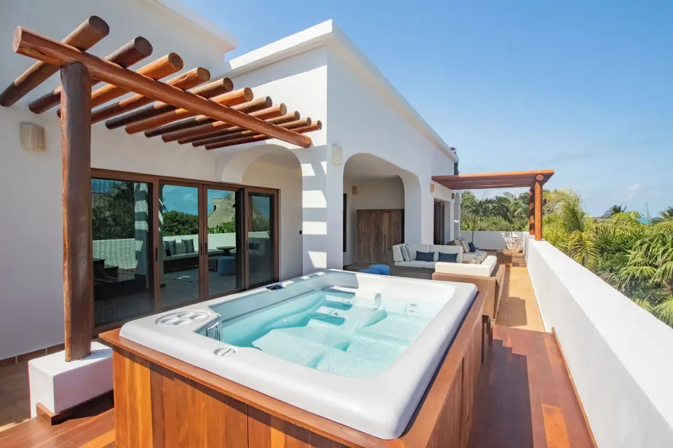 Suite Imperial Privé terrace with outdoor whirlpool at Valentin Imperial Riviera Maya.