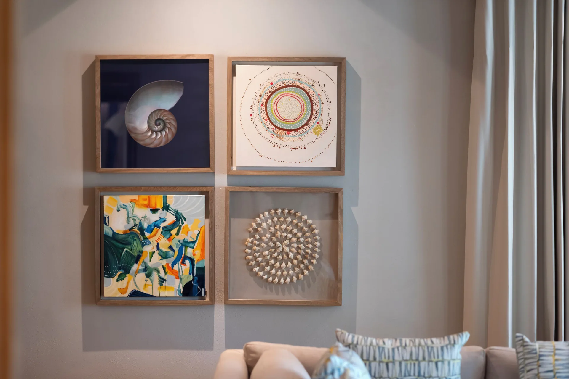 Onyx Suite wall art and sofa detail at Valentin Imperial Riviera Maya.