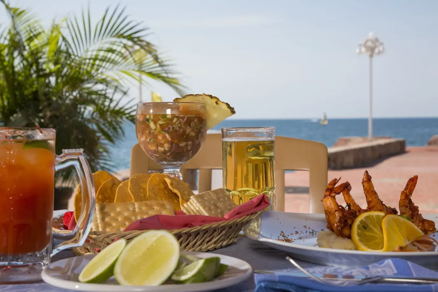 Seafood and drinks by the ocean at Vamar Vallarta Marina and Beach Resort.