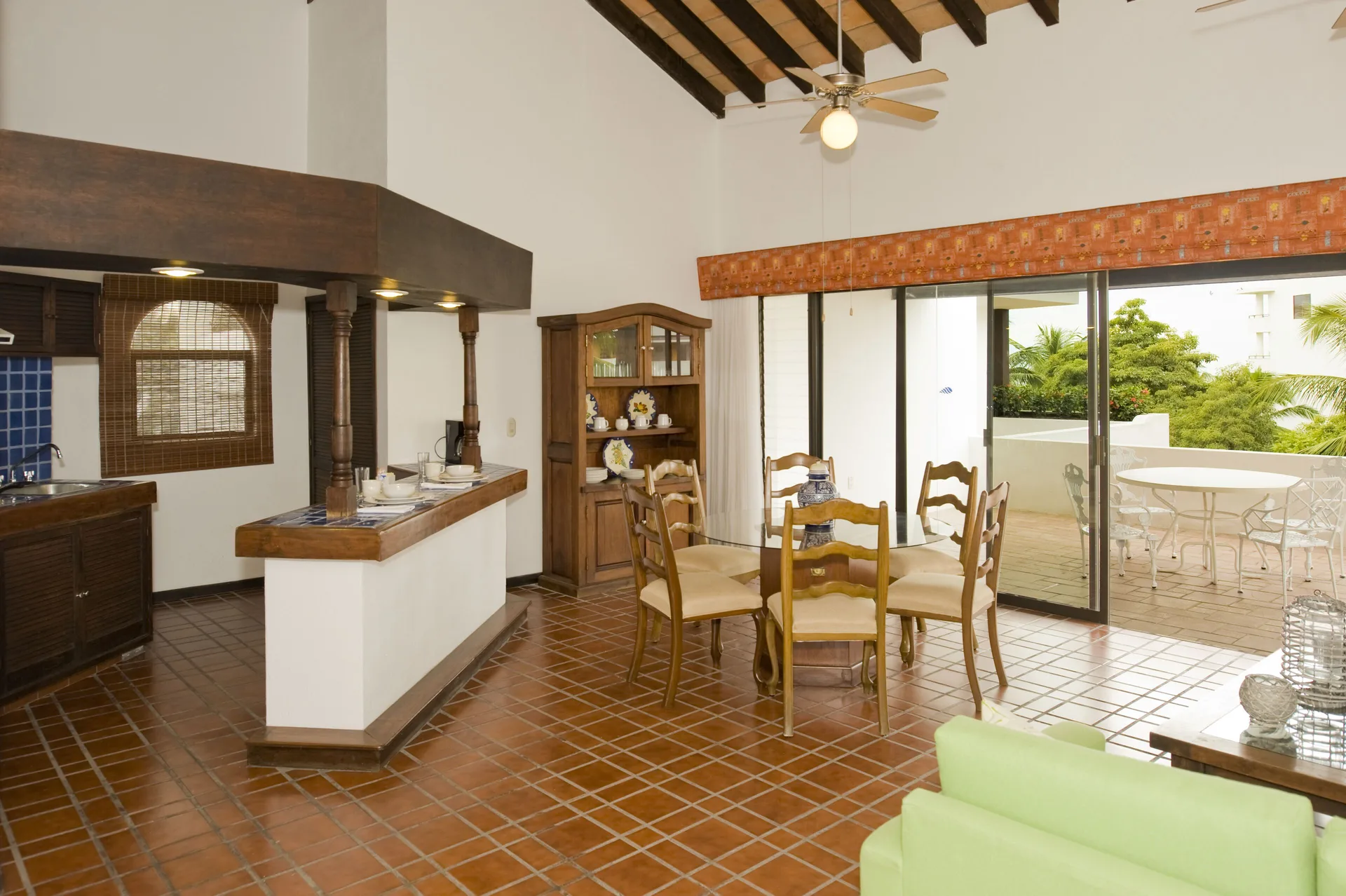 One Bedroom Villa dining area and kitchenette at Vamar Vallarta Marina and Beach Resort.