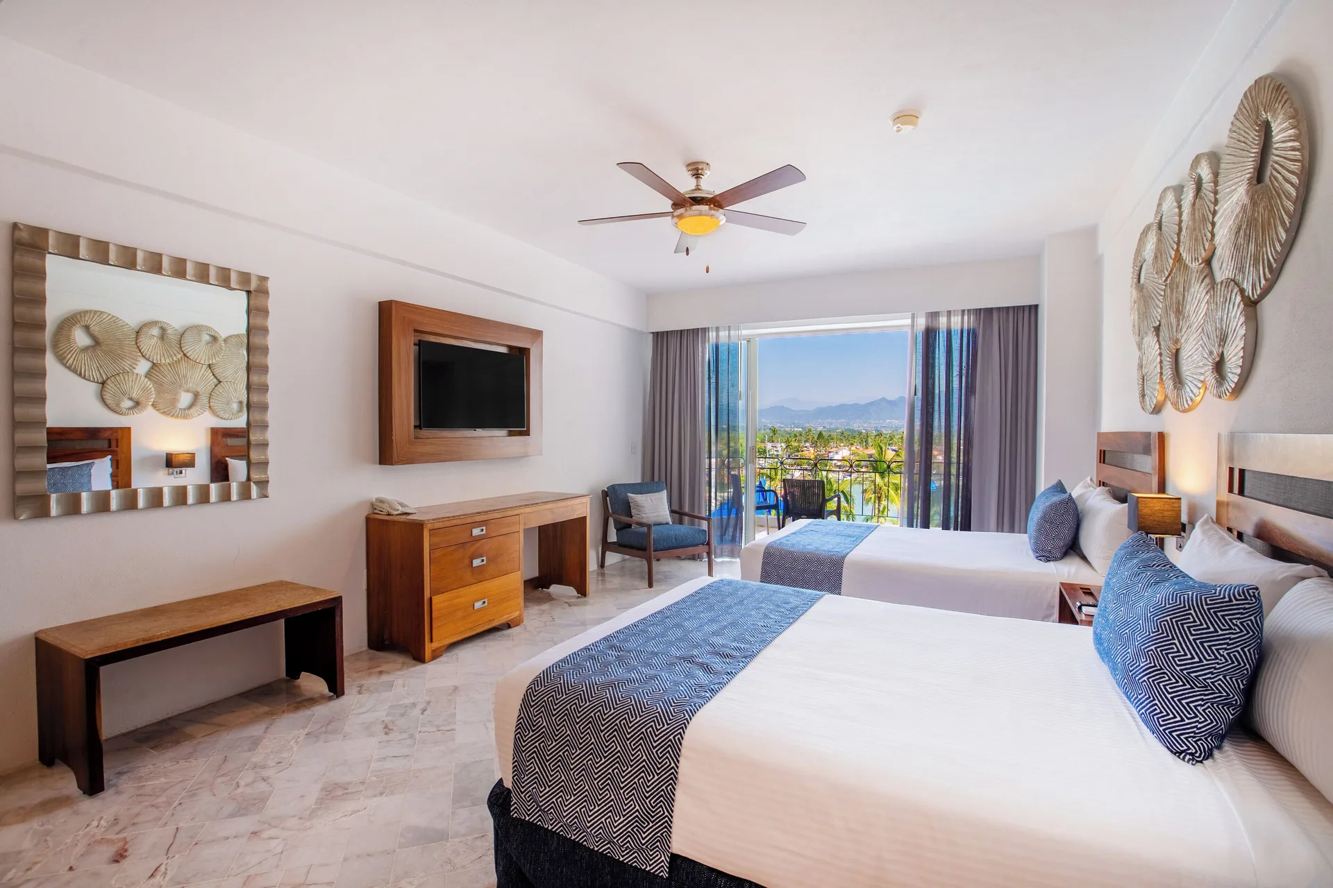 Superior Room with Balcony at Vamar Vallarta Marina and Beach Resort featuring two beds and outdoor balcony space in Puerto Vallarta.