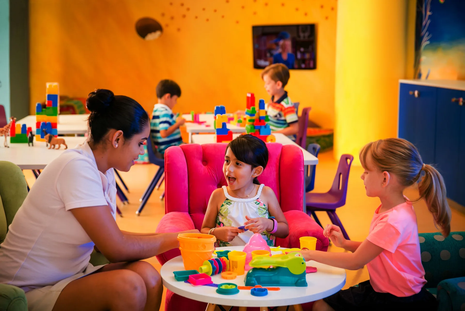 Children playing with toys in the kids club at Velas Vallarta Suites Resort.