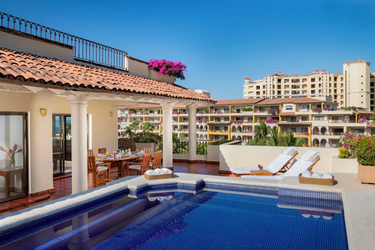 Private terrace pool with loungers at Velas Vallarta Suites Resort.