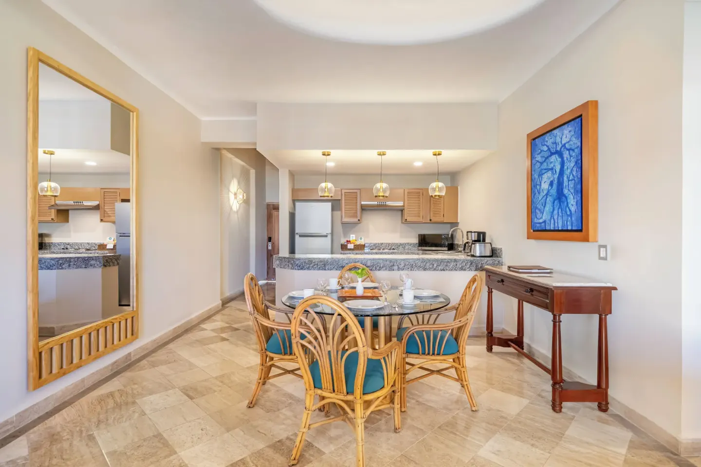 Deluxe Suite dining area and kitchenette at Velas Vallarta Suites Resort.