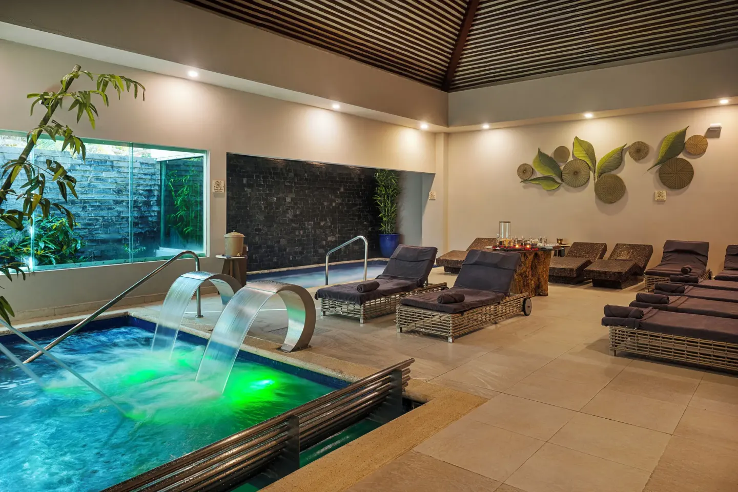 Spa hydrotherapy pool with loungers at Ventus at Marina El Cid Spa & Beach Resort.