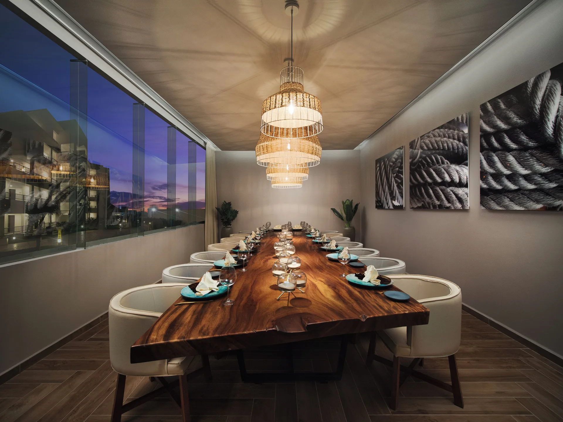 Private dining room with long wood table at Ventus at Marina El Cid Spa & Beach Resort.