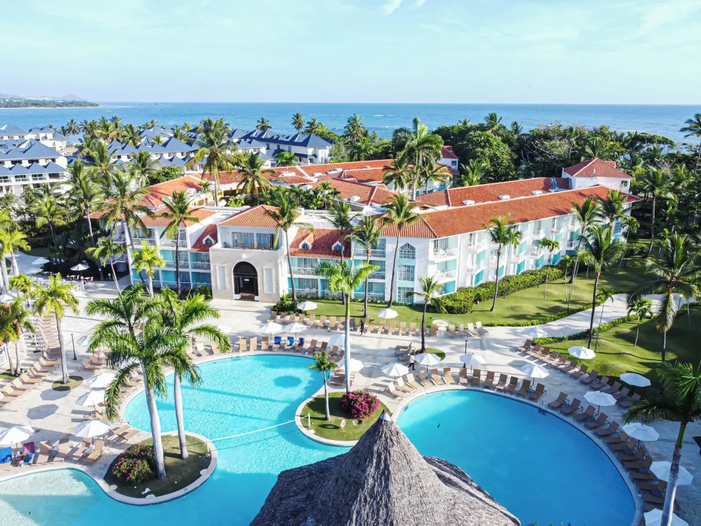 Aerial resort view with pools, palms and ocean beyond VH Gran Ventana Beach Resort.