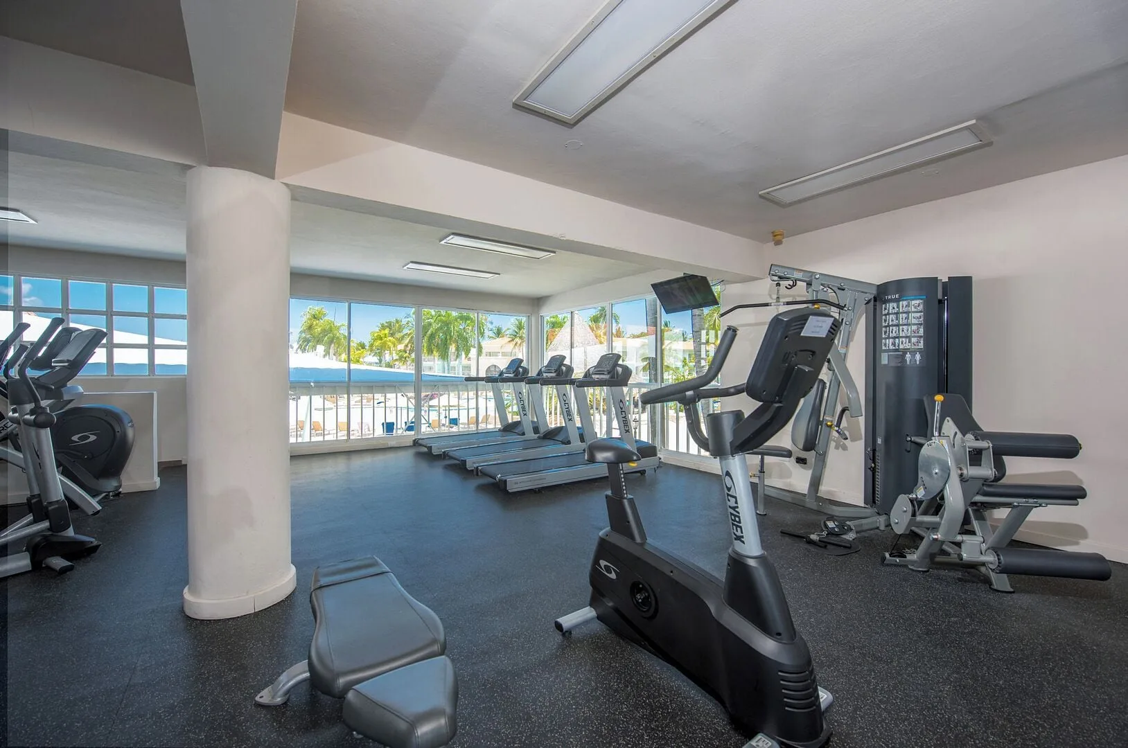 Fitness center with treadmills and weight machines at VH Gran Ventana Beach Resort.