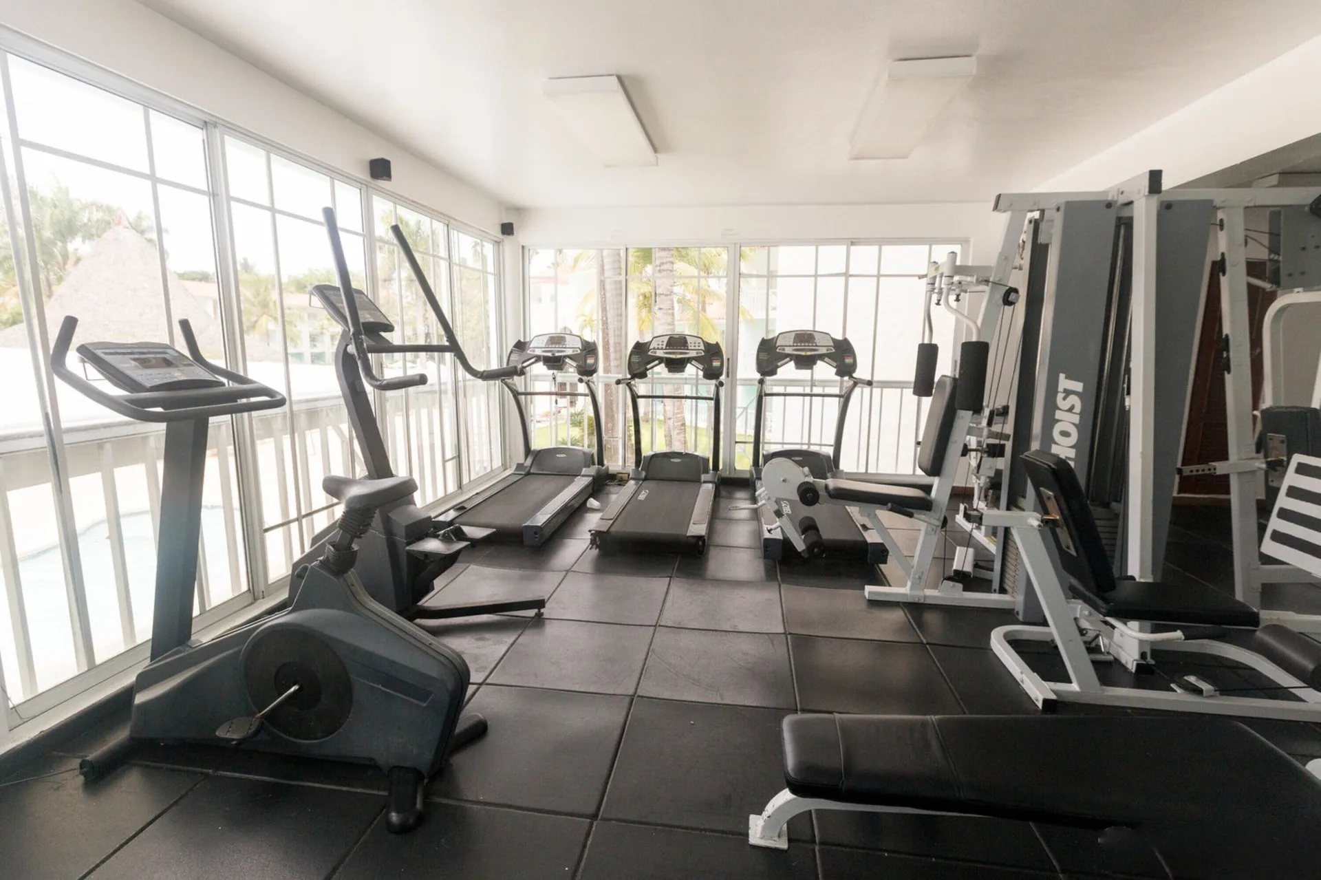 Fitness room with treadmills, bike and weight machines at VH Gran Ventana Beach Resort.