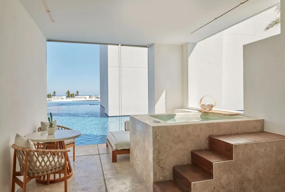 Junior Suite terrace plunge pool beside a resort water feature at Viceroy Los Cabos.