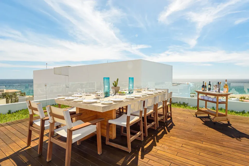 Penthouse outdoor dining table with ocean view at Viceroy Los Cabos.
