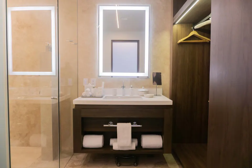 Penthouse bathroom vanity and closet area at Viceroy Los Cabos.