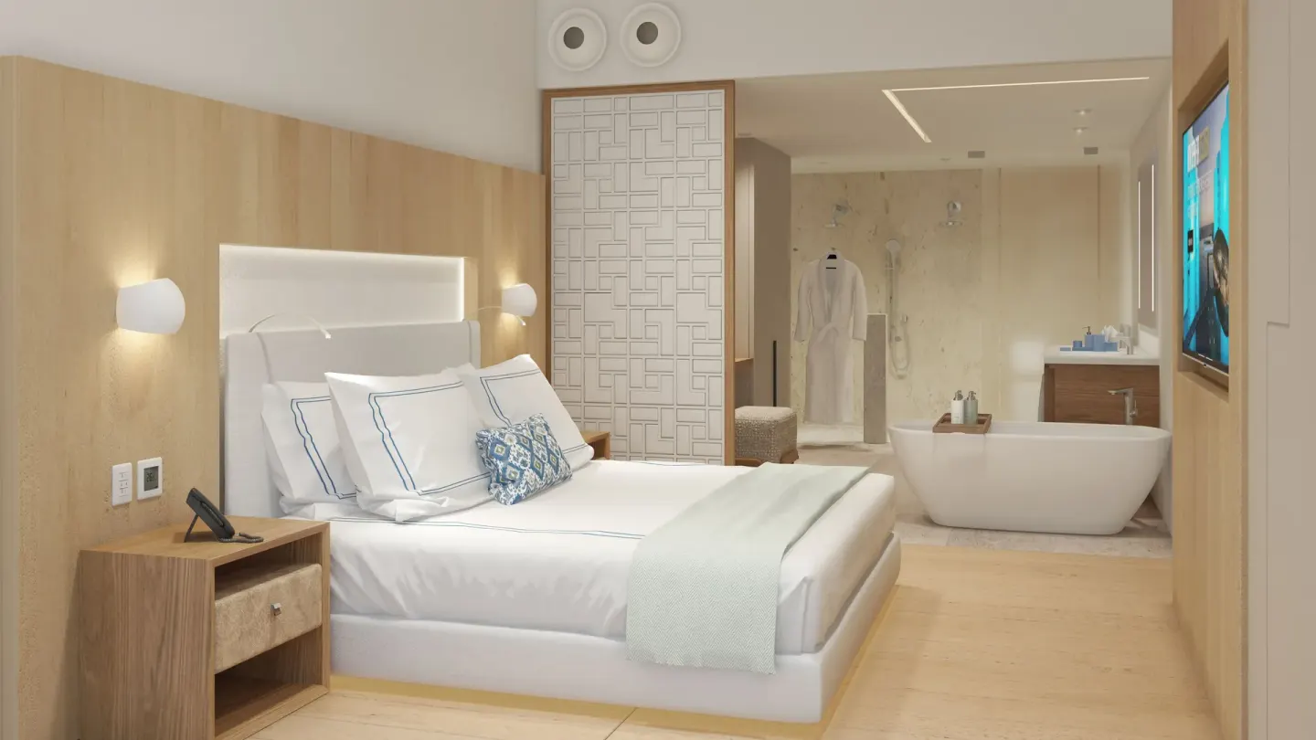 One Bedroom Partial Ocean View suite bed and open bath at Viceroy Los Cabos.