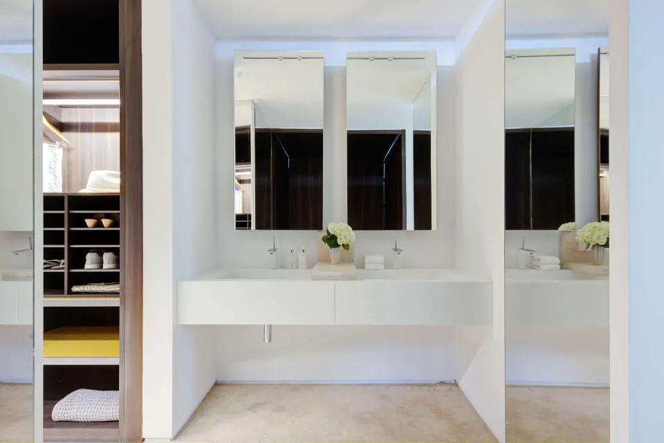 Villa bathroom vanity and open closet at Viceroy Los Cabos.