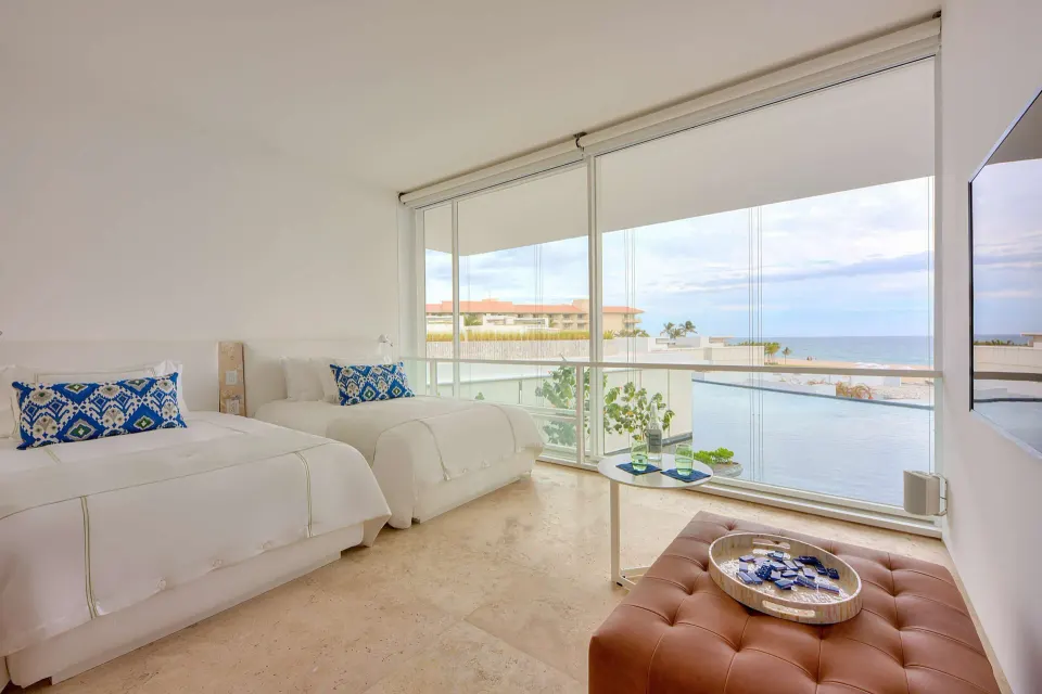 Villa twin bedroom with water and ocean views at Viceroy Los Cabos.