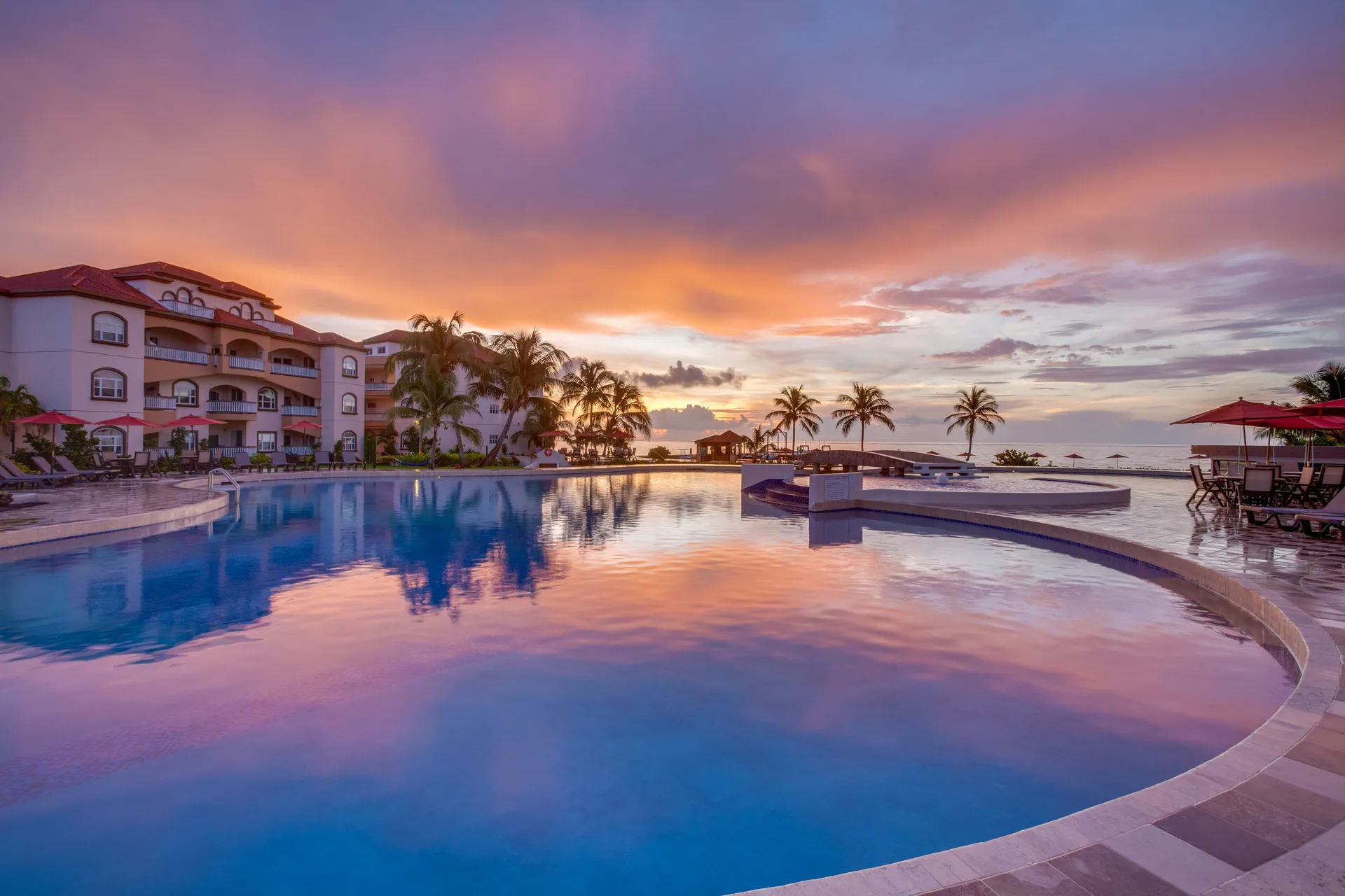 Grand Caribe Belize beachfront condominium resort with spacious residences and multiple pools